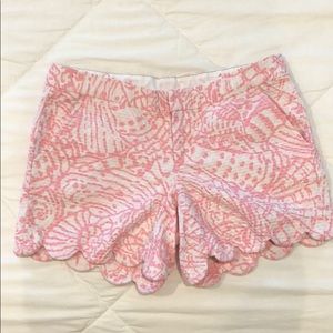 Lilly Pulitzer pink and white scalloped shorts.